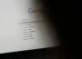 black laptop computer turned on displaying google search