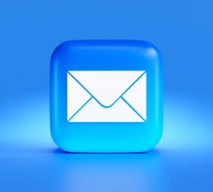 a blue button with a white envelope on it