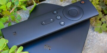 black media streaming device on gray ceramic tile