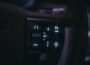 a close up of a car dashboard with buttons