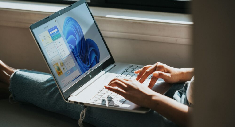 person working on Windows 11 computer