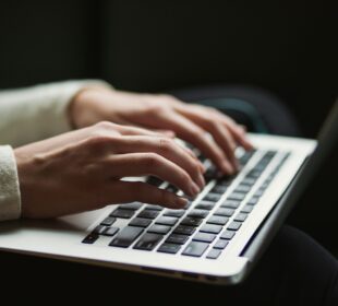person using laptop