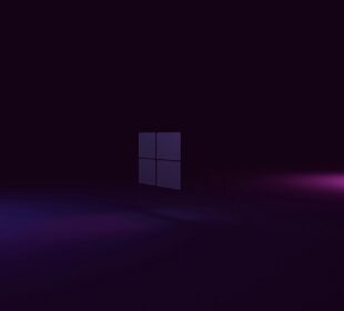 a dark room with a purple light coming out of the window