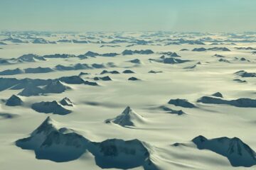 snow covered mountain during daytime