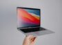 macbook pro on white table