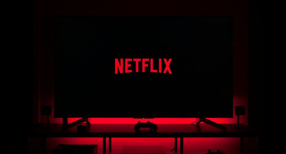 flat screen television displaying Netflix logo