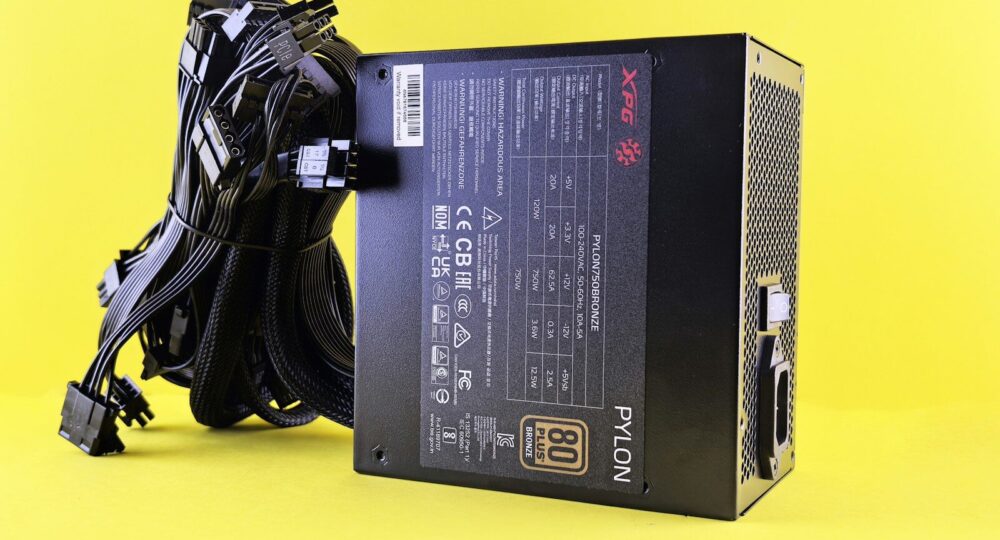 Black computer power supply unit with cables