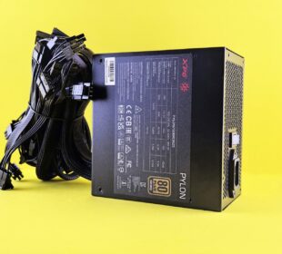Black computer power supply unit with cables