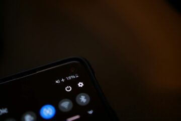 black remote control on white surface