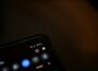 black remote control on white surface