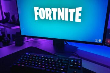 black flat screen computer monitor with black computer keyboard