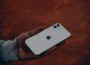 a person holding an iphone in their hand