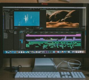 black iMac, Apple Magic Keyboard, and Apple Magic Mouse