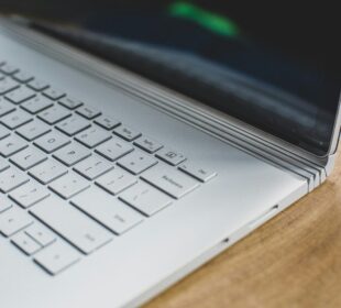 white and black laptop computer