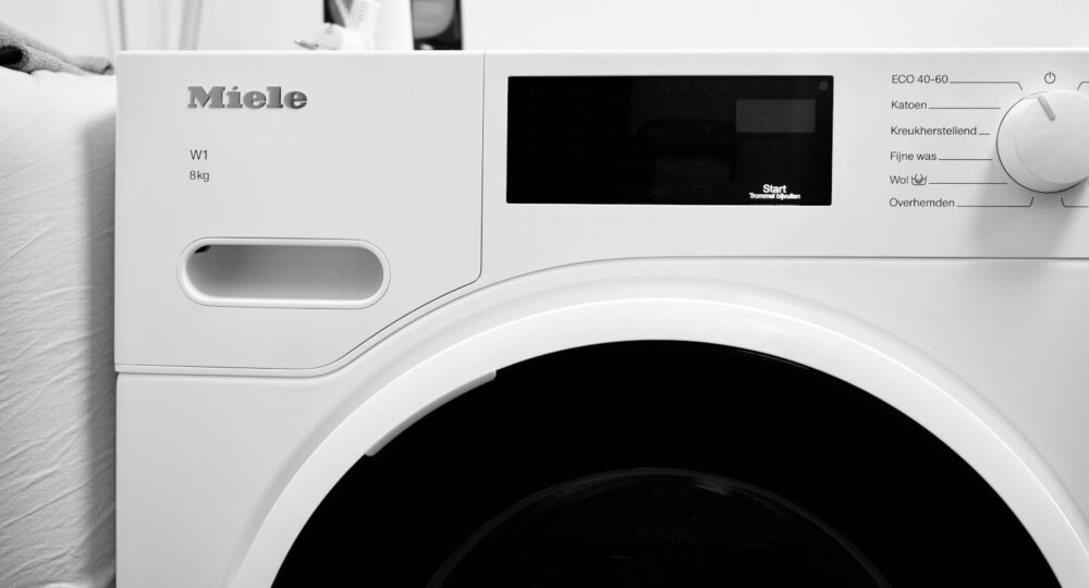 Close-up of a white miele washing machine