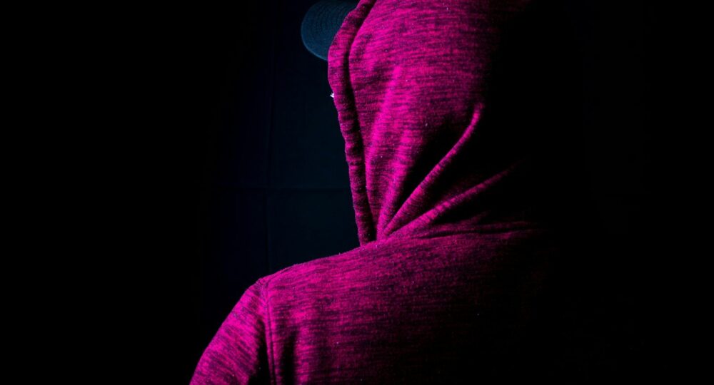 person wearing purple hoodie